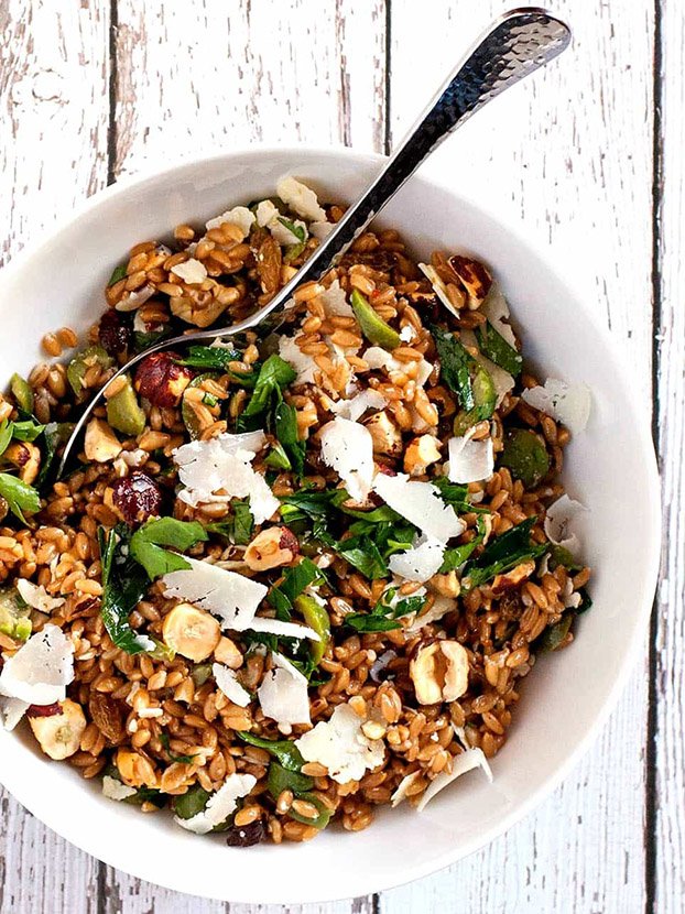 Farro Salad with Green Olives, Hazelnuts and Raisins .