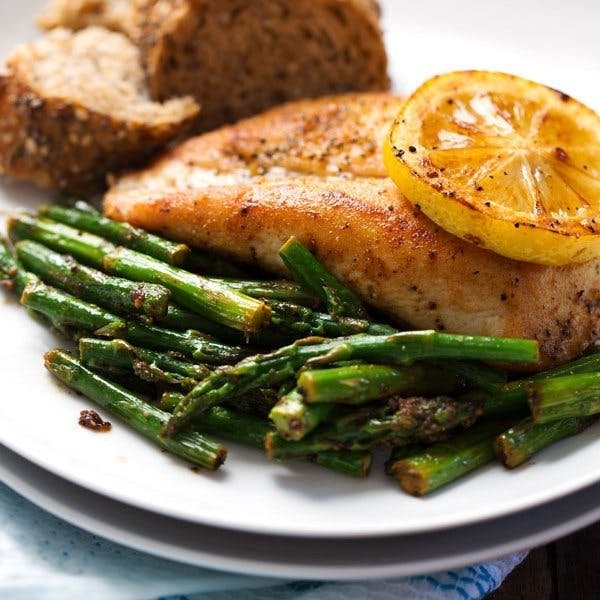 Lemon chicken with asparagus.