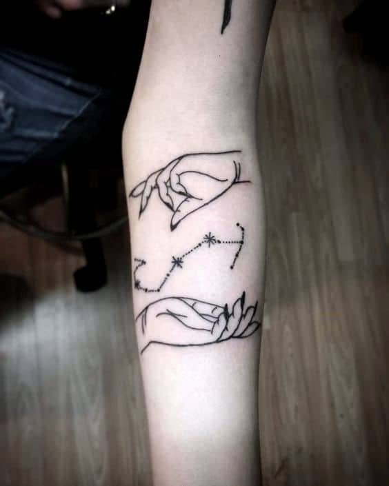 Scorpio constellation in the palms tattoo.