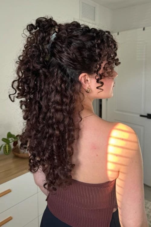 Curly Cascade With a Hair Clip