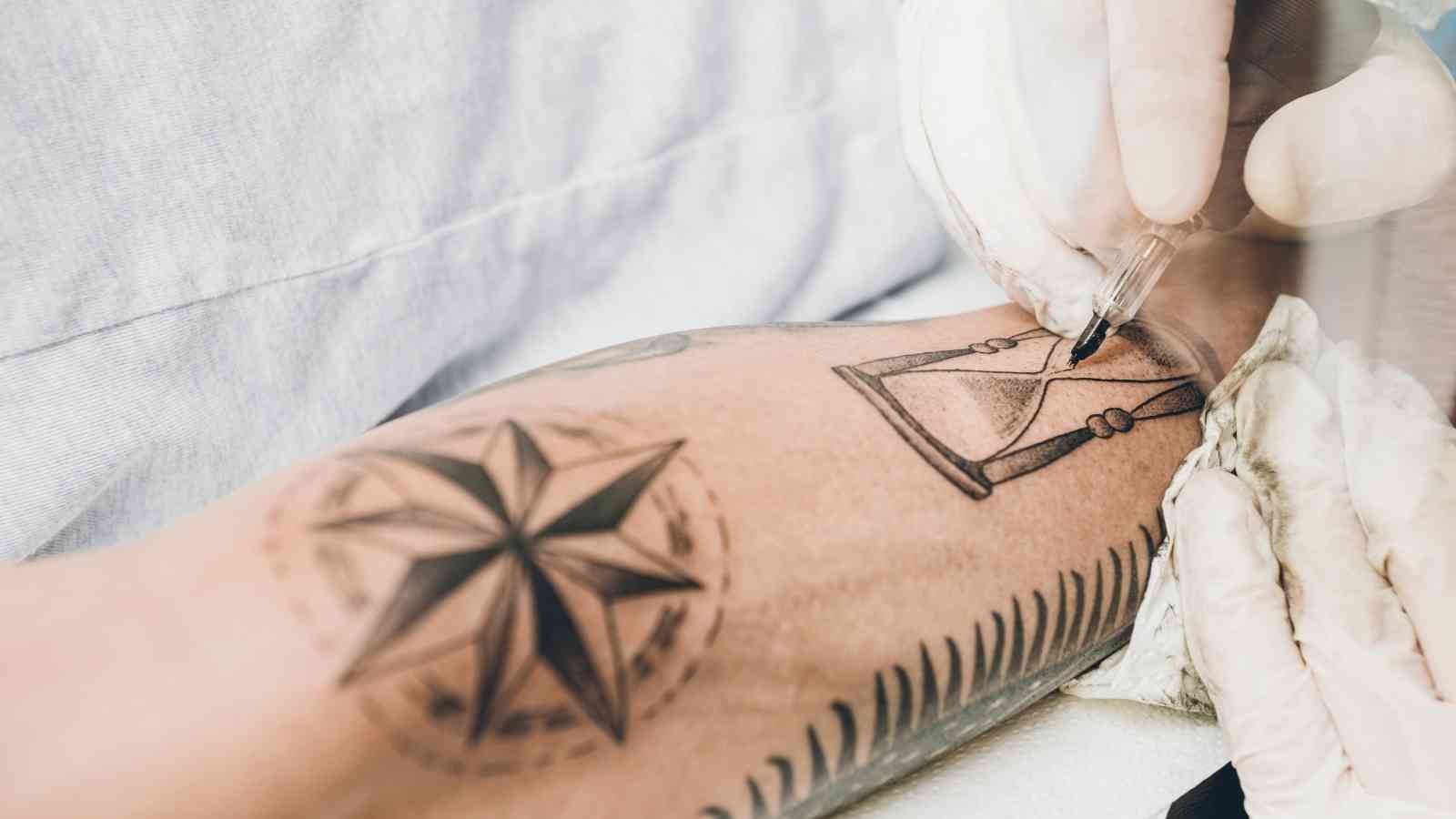 2. "Feminine Hourglass Tattoo Ideas for the Modern Woman" - wide 1