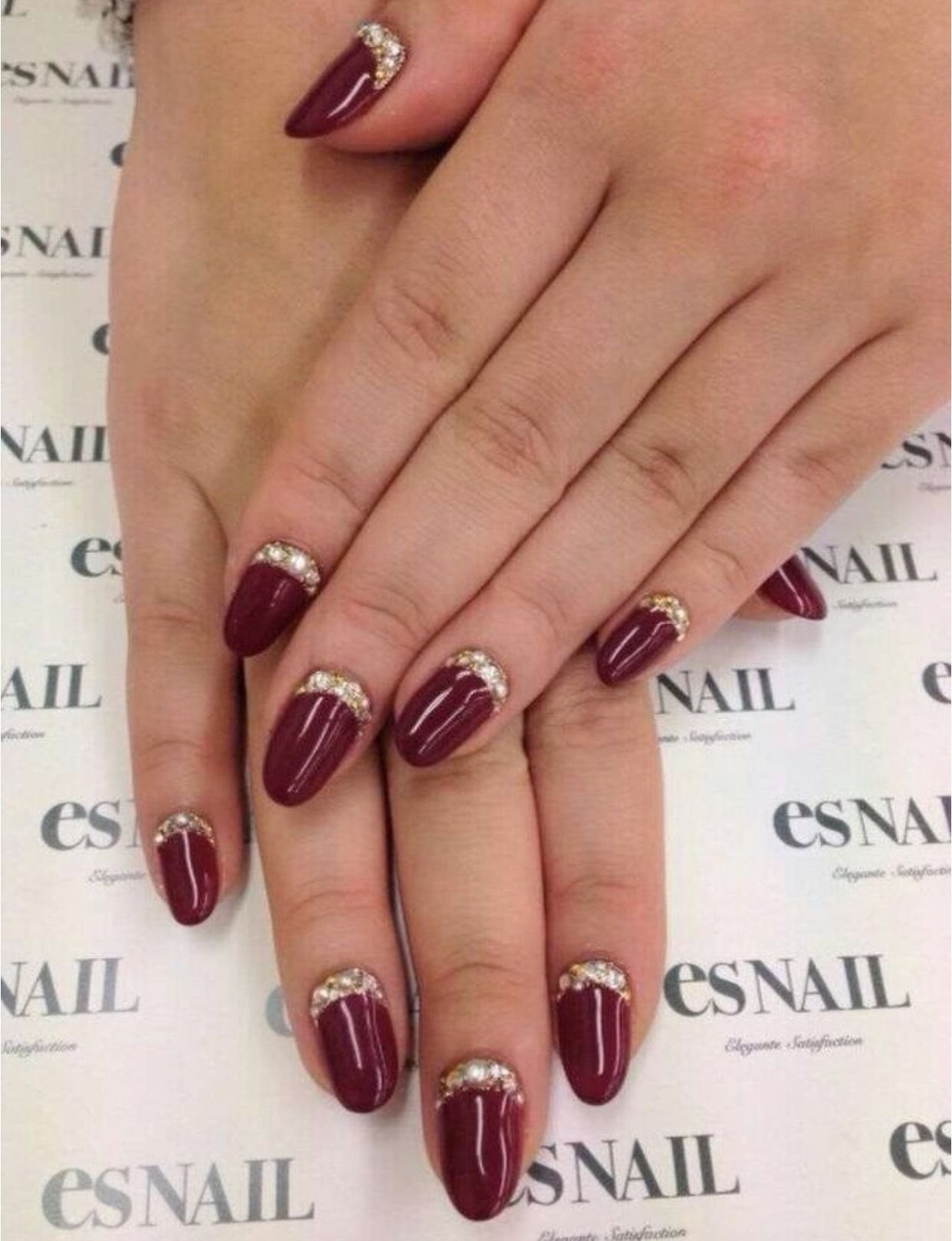 Red and gold nails combination