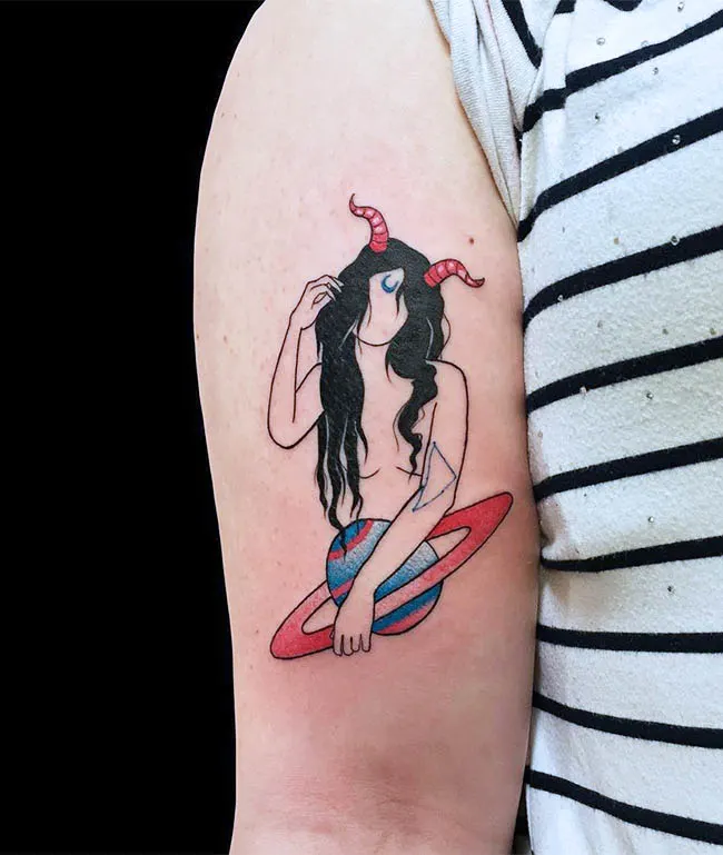 A playful Capricorn girl tattoo