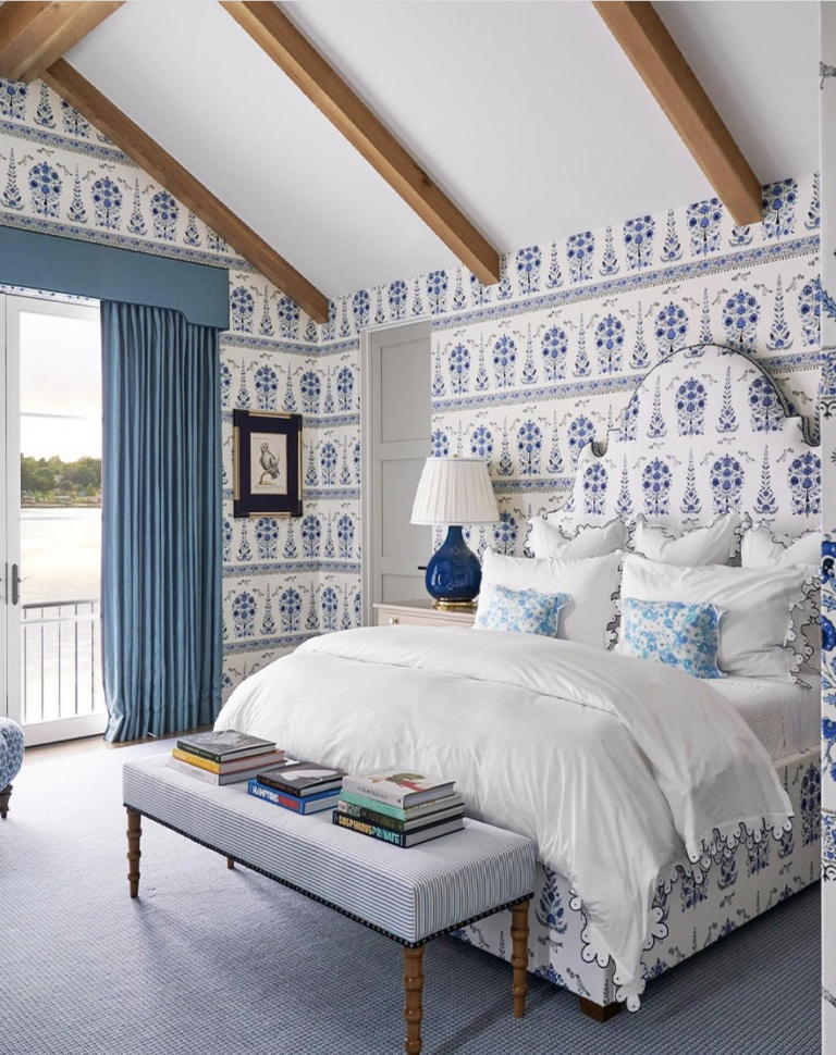Blue Patterned Wallpaper And Bed With Blue Carpet
