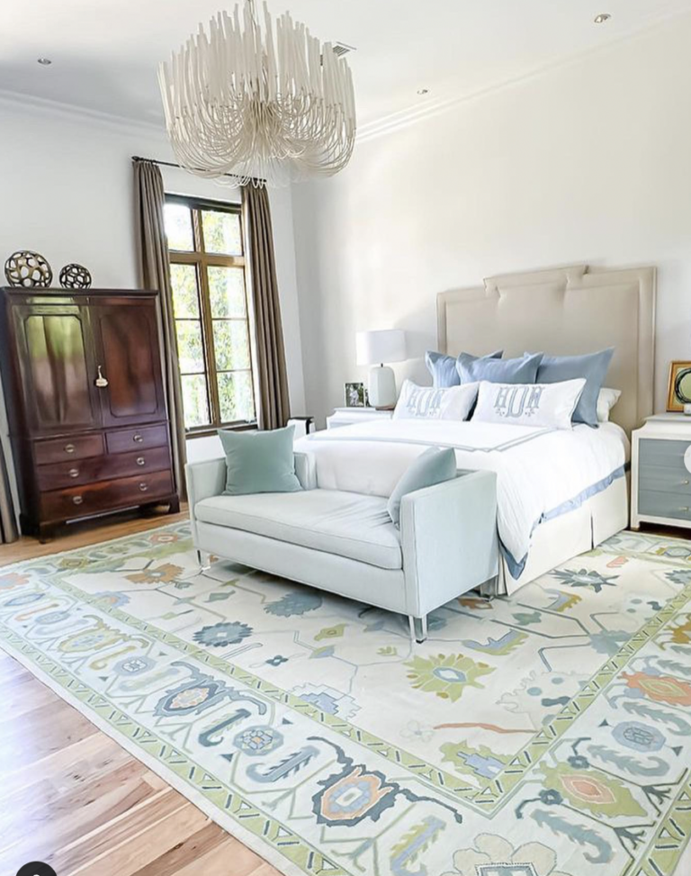 Bold Patterned Carpet With Beige bed