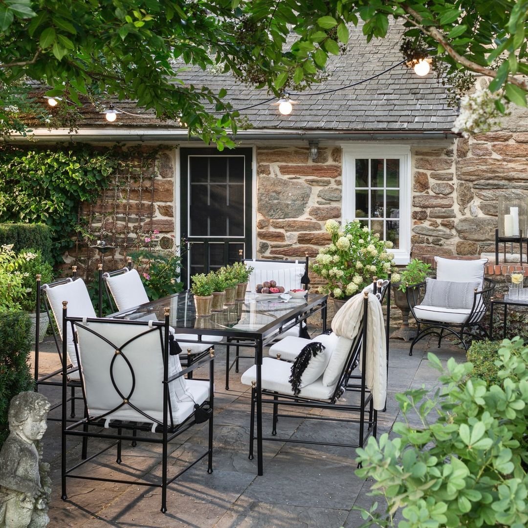 Enchanted Dining Under a Vine-Adorned Pergola