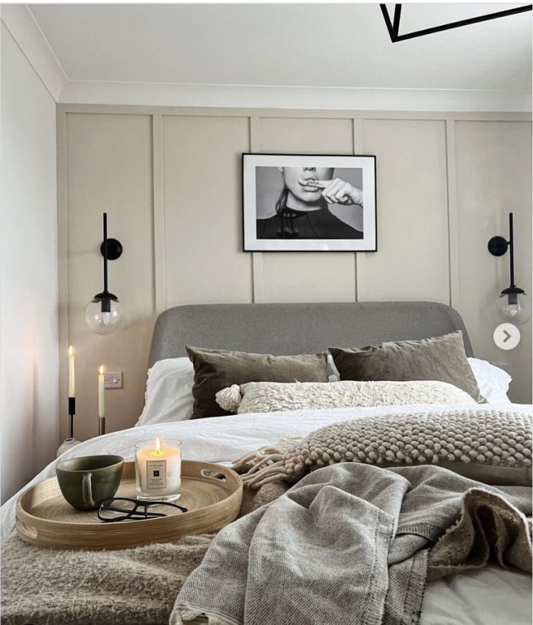 Neutral Bedroom With Unique Wall Sconces