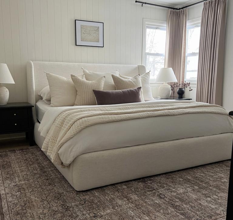 White Bed With Grey All Over Carpet