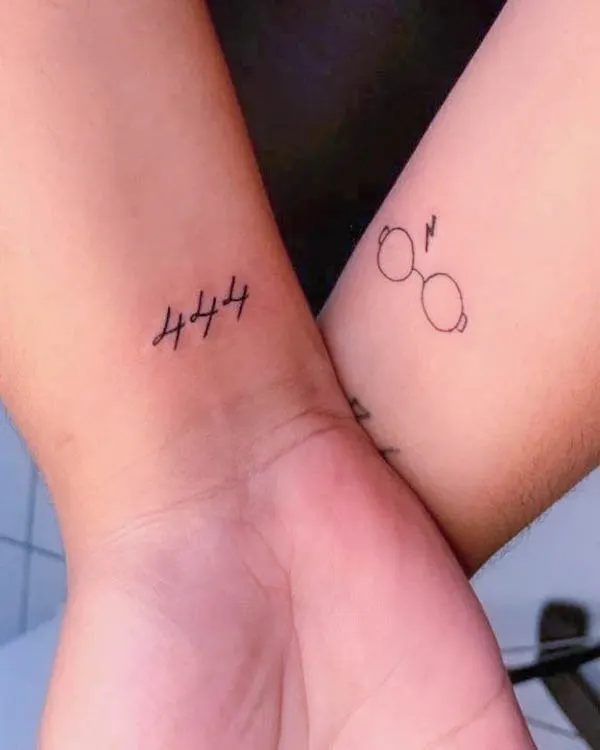 444 wrist tattoo and Harry Potter glasses