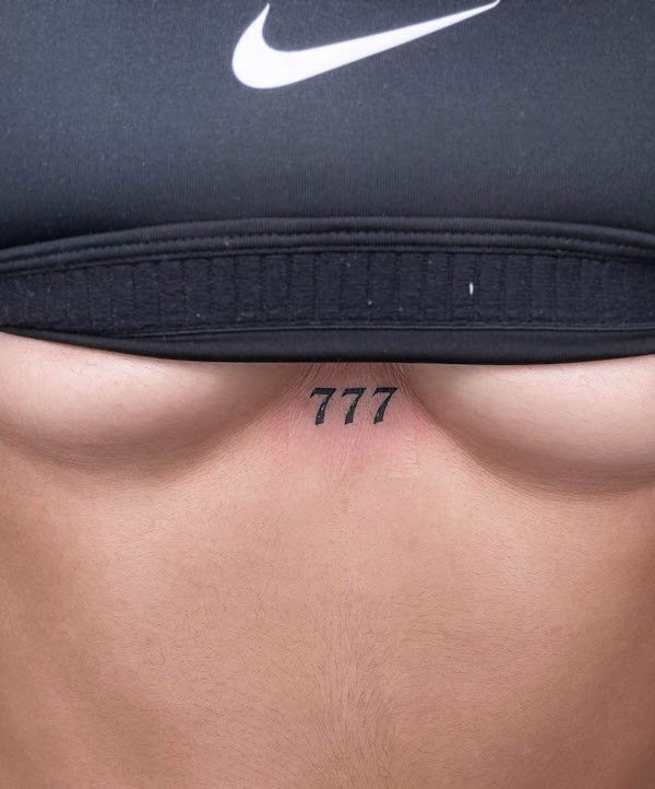 777 underboob tattoo