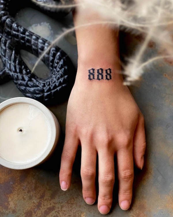 Bold 888 wrist tattoo