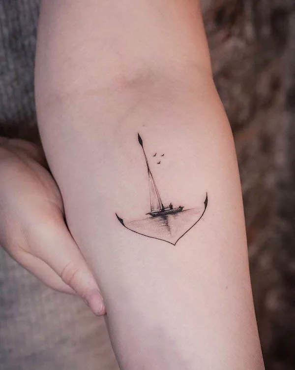 Boat and anchor forearm tattoo