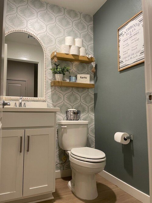 Botanical patterned wallpaper with wooden accents