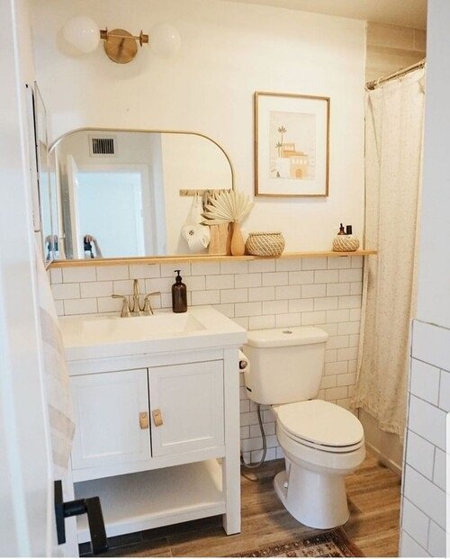 Long floating shelf with boho decor accents