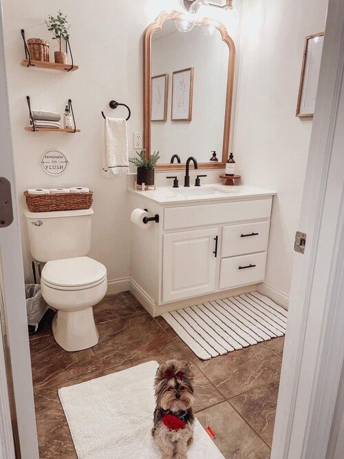 Wooden-framed mirror with floating shelves
