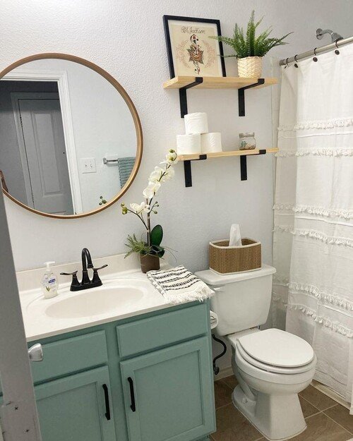 Aqua cabinet with minimalist shelving decor