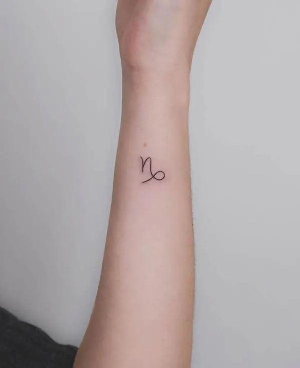Capricorn forearm tattoo