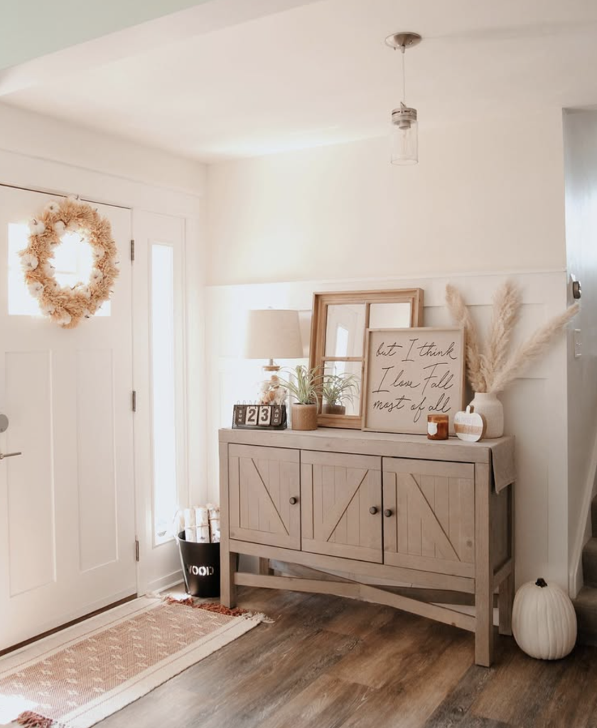 Console Table with Decor That Says “Welcome”