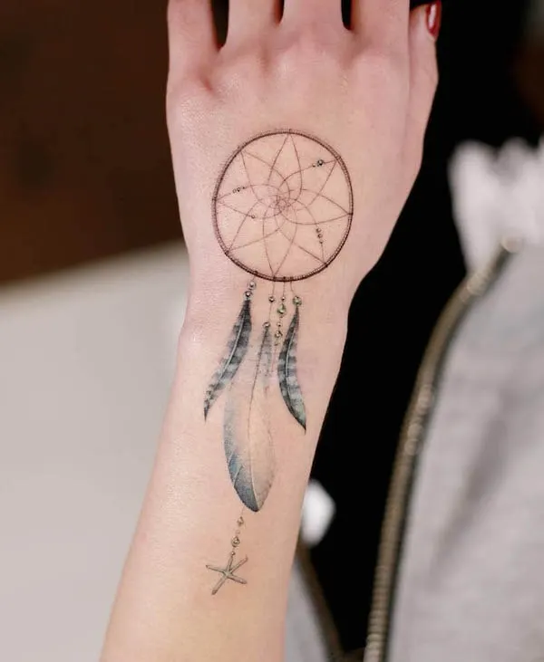 Dreamcatcher hand tattoo