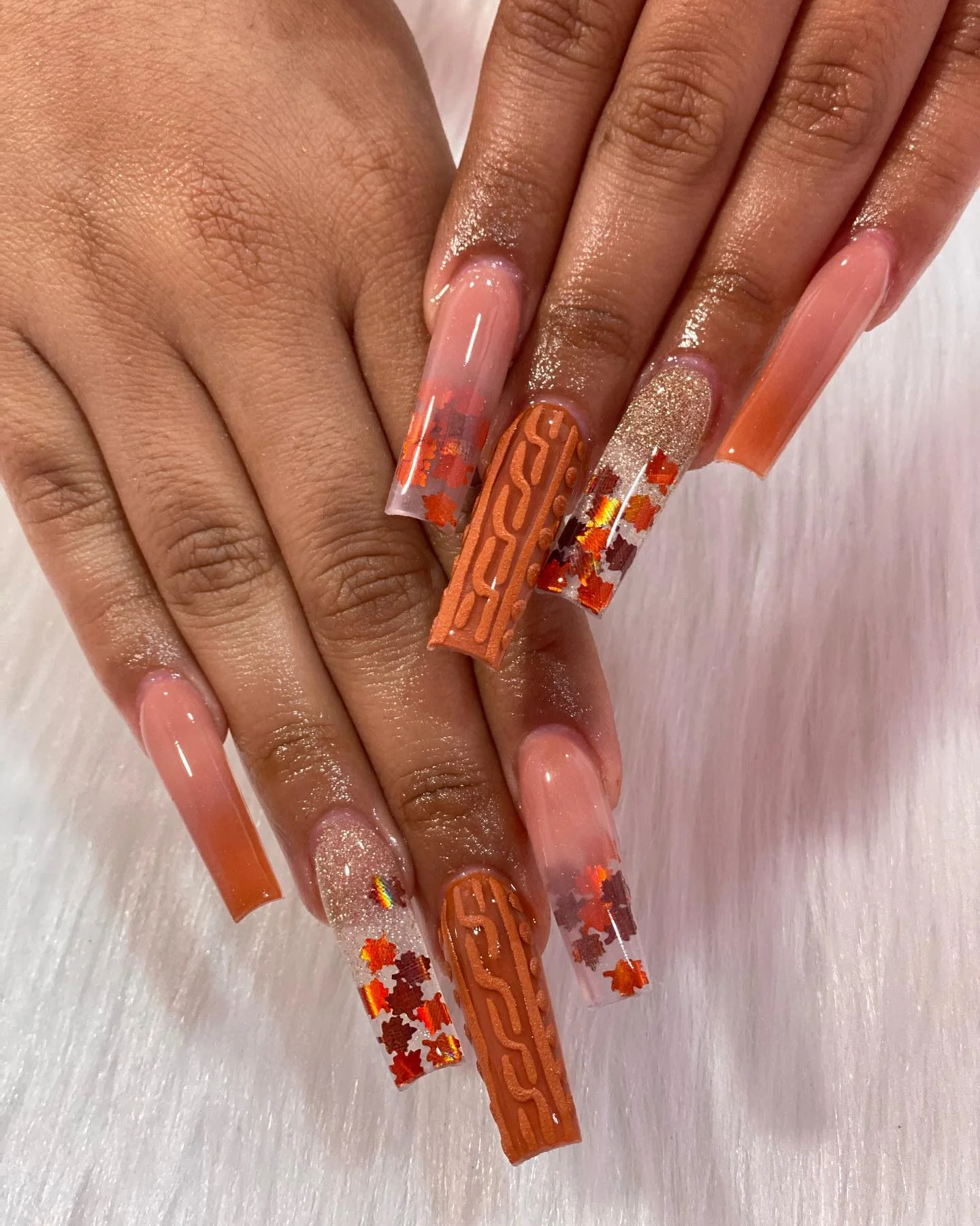 Fall-Inspired Orange and Glitter Acrylic Nails