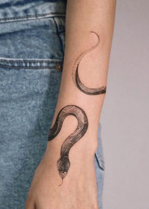 Girly snake armband tattoo