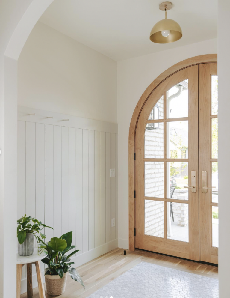 Light Wood Floor With Arched Door