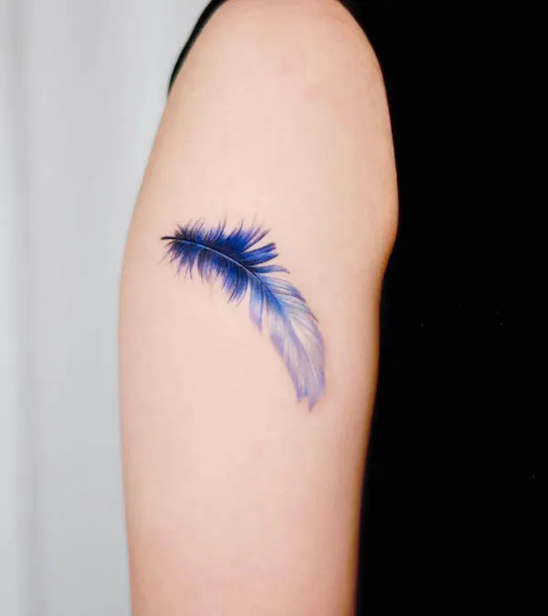 Meaningful feather tattoo