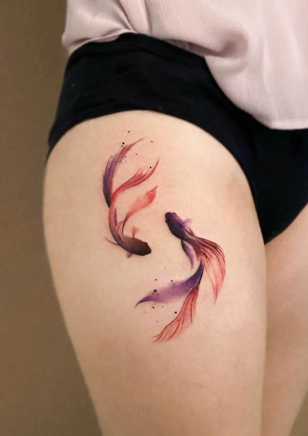 Pisces fish thigh tattoo