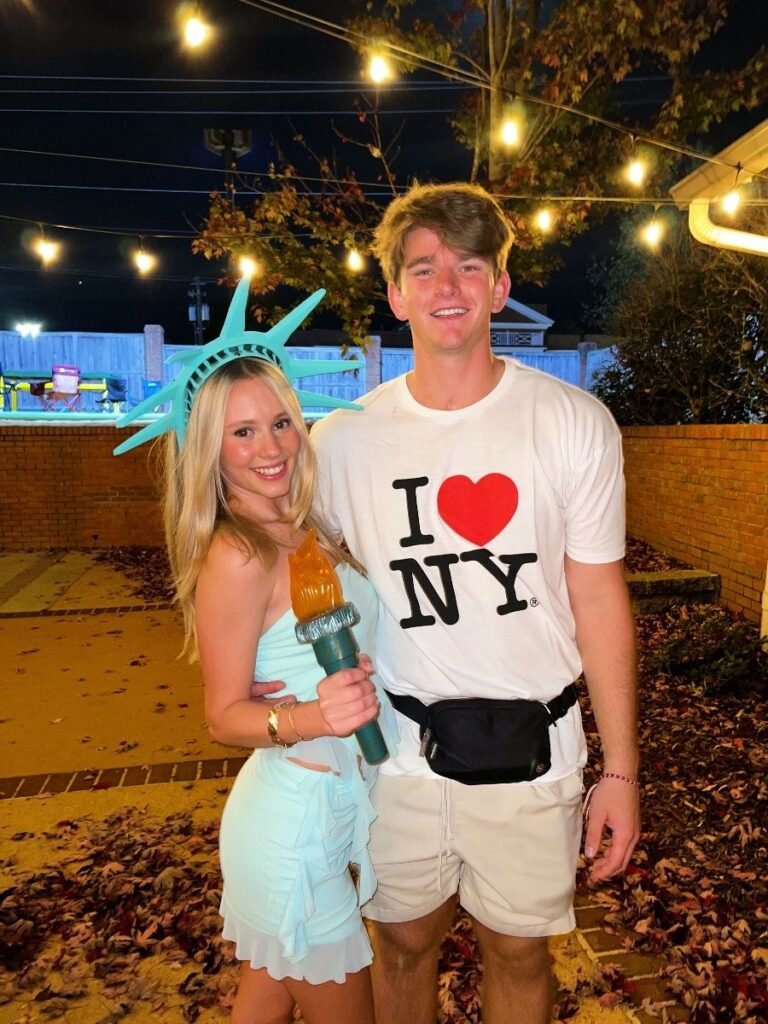STATUE OF LIBERTY AND TOURIST