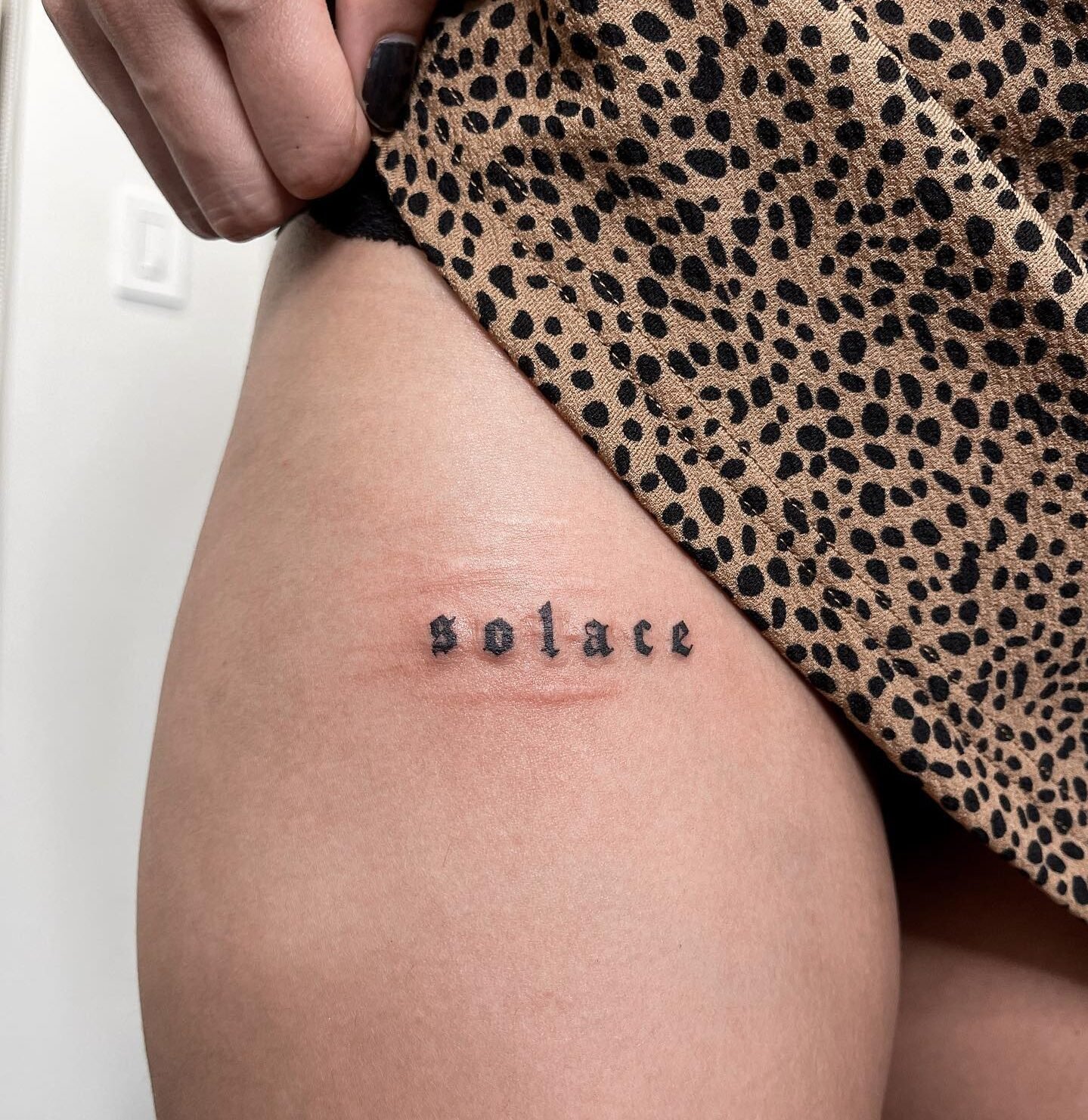 One Word Thigh Tattoos