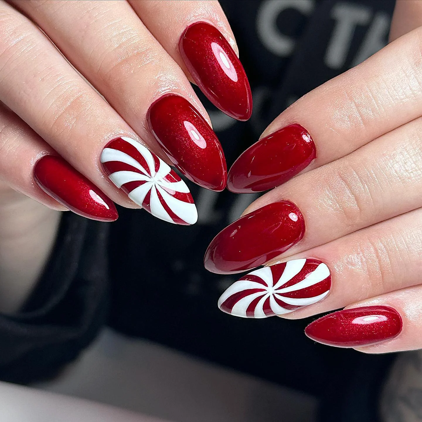 White & Red Swirl Candy Cane Almond Nails