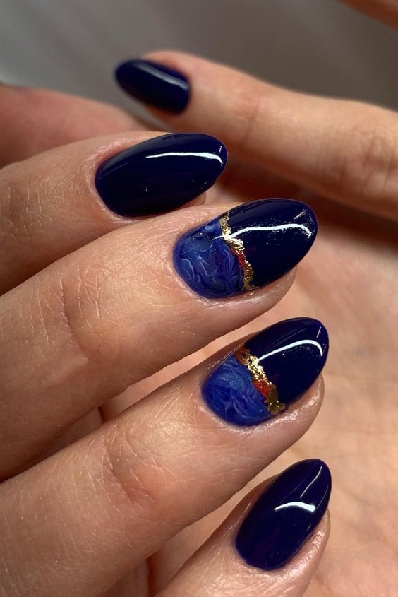 Black Almond Nails With Marble Blue and Gold Strips
