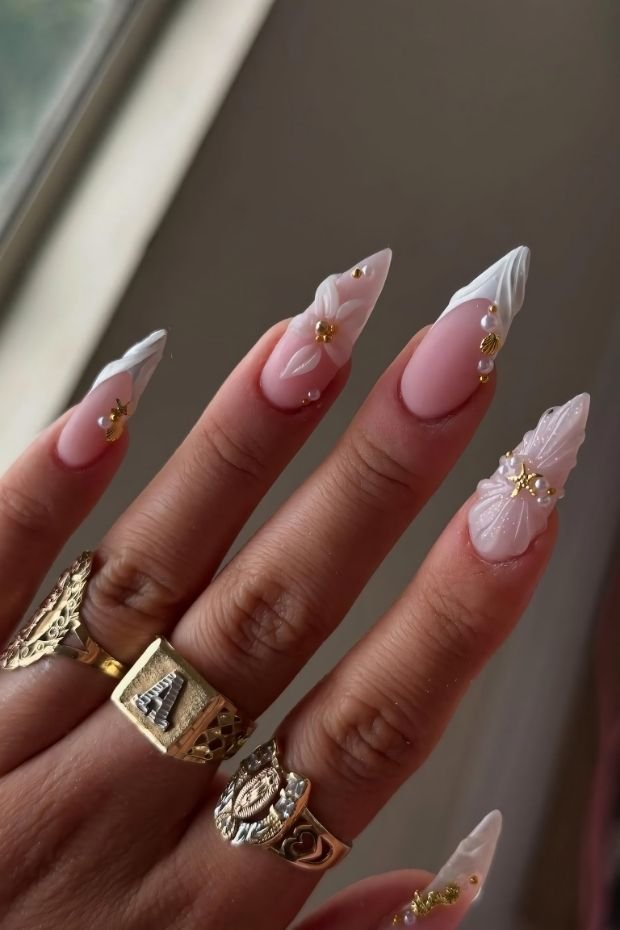 French Tip Nails with Gold Accents and 3D Nail Art