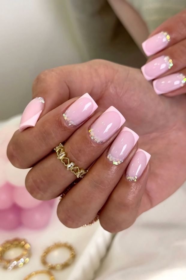 Pink French Tip Nails with Sparkling Accents