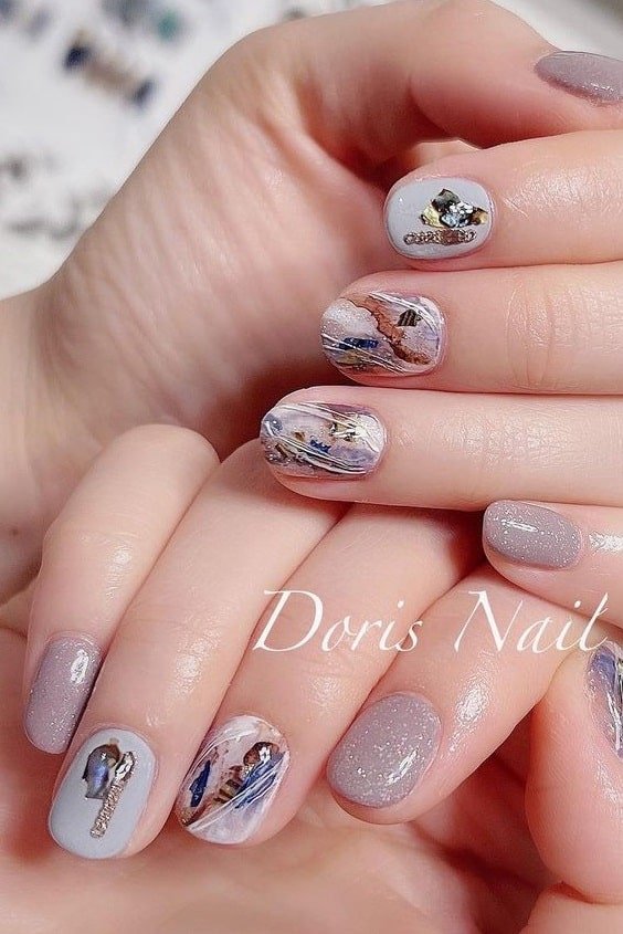Short Nails with Abstract Designs
