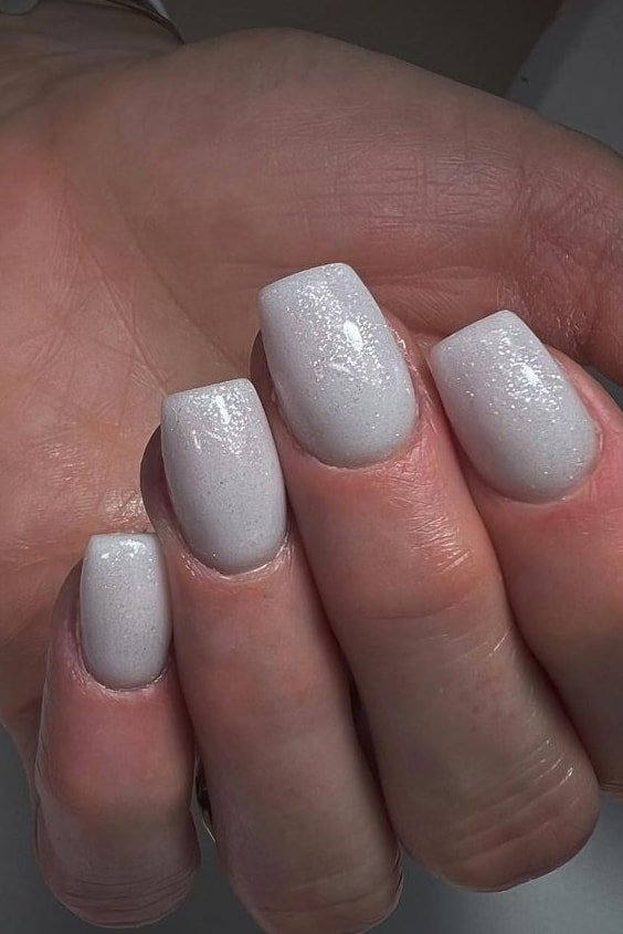 White Nails with Silver Glitters

