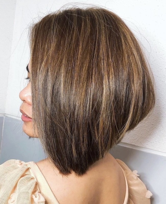Angled Bob with Caramel Highlights on Brown Hair