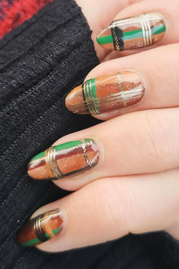 Geometric Nail Art with Gold Accents